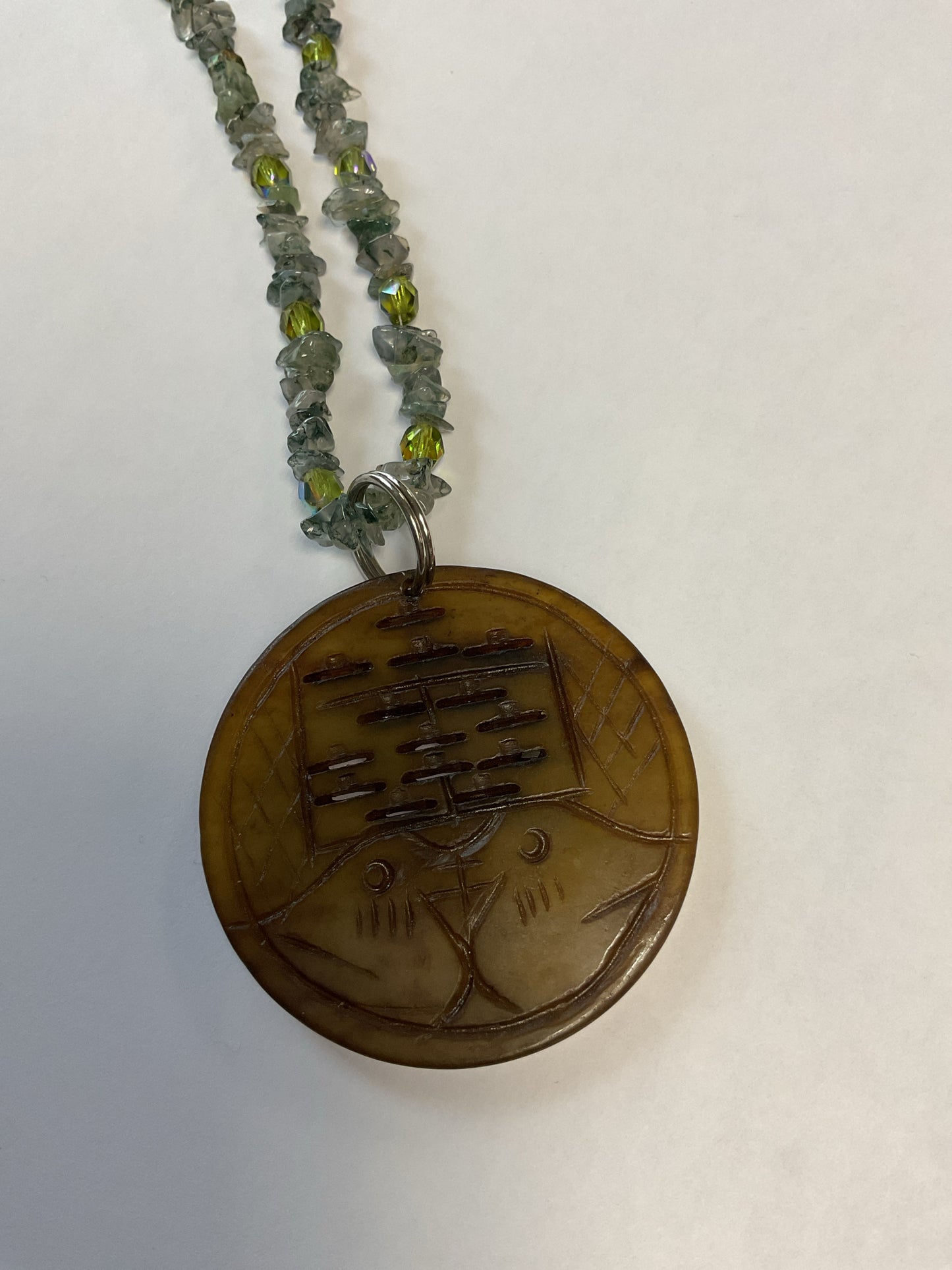 Necklace blue green stones with large round bird pendant