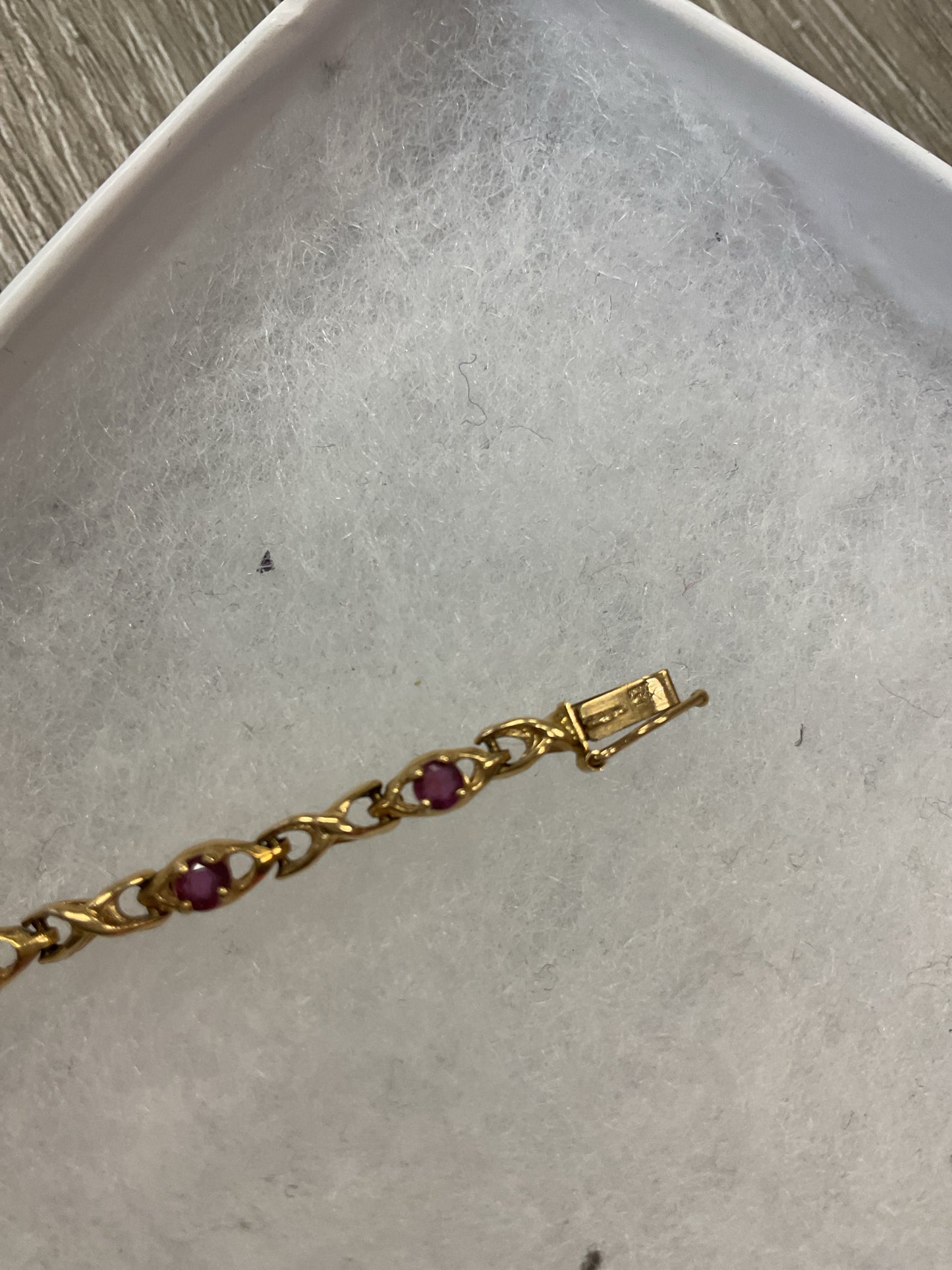 14K Bracelet ruby tennis 7"