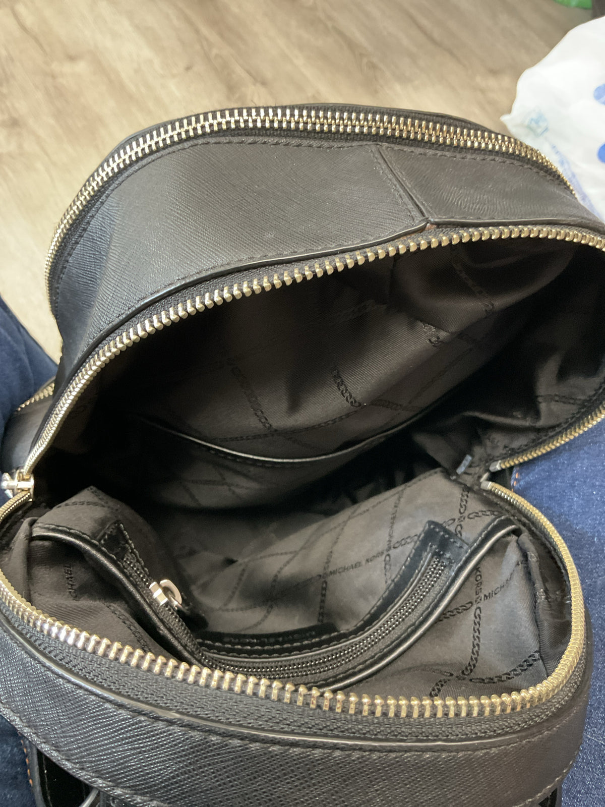 Michael Kors Backpack perforated MK silver zippers medium