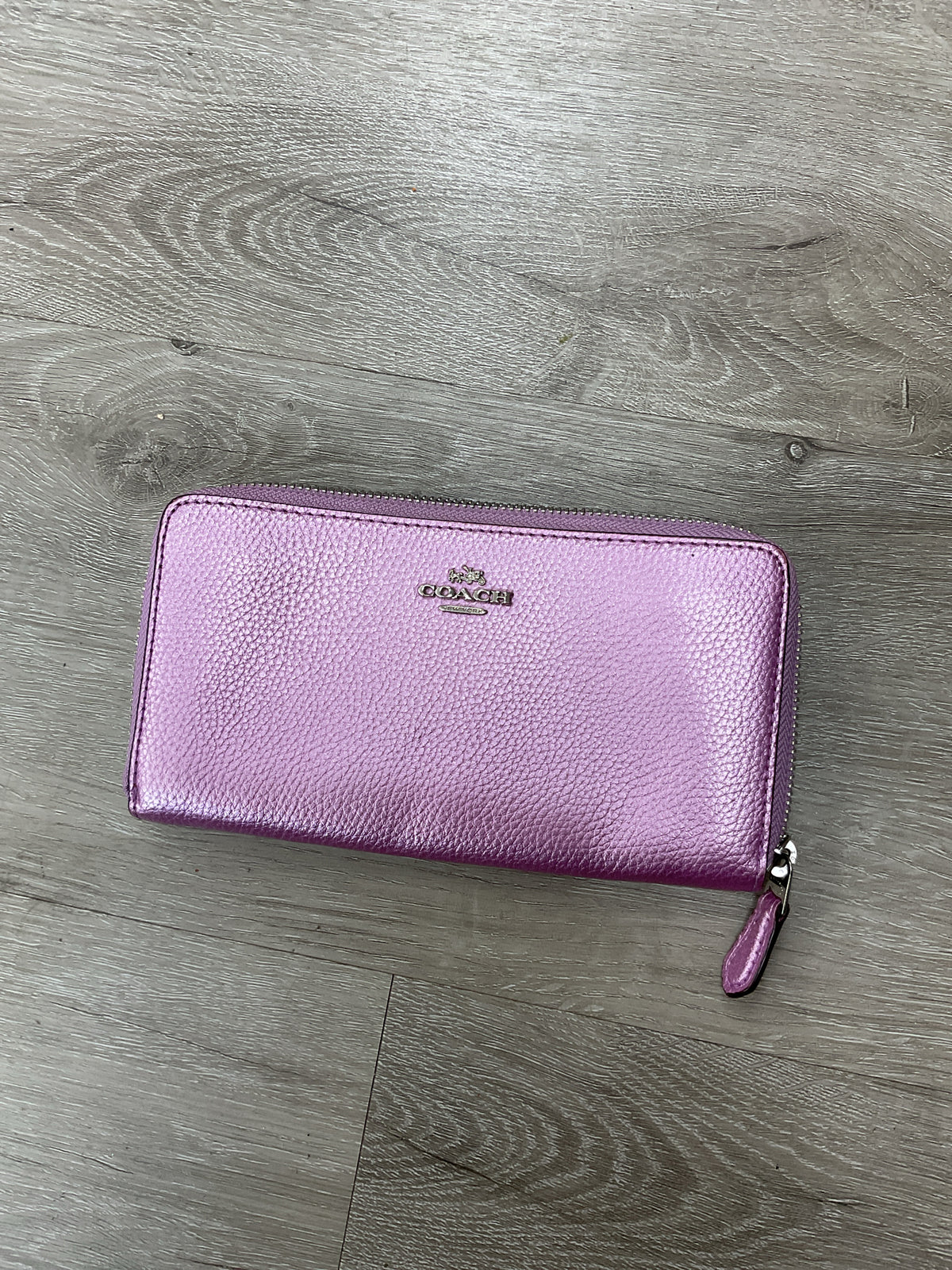 coach Wallet metallic pink full size zip around ink spot on back