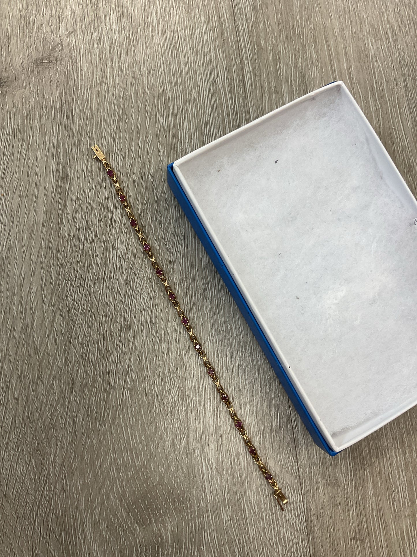 14K Bracelet ruby tennis 7"
