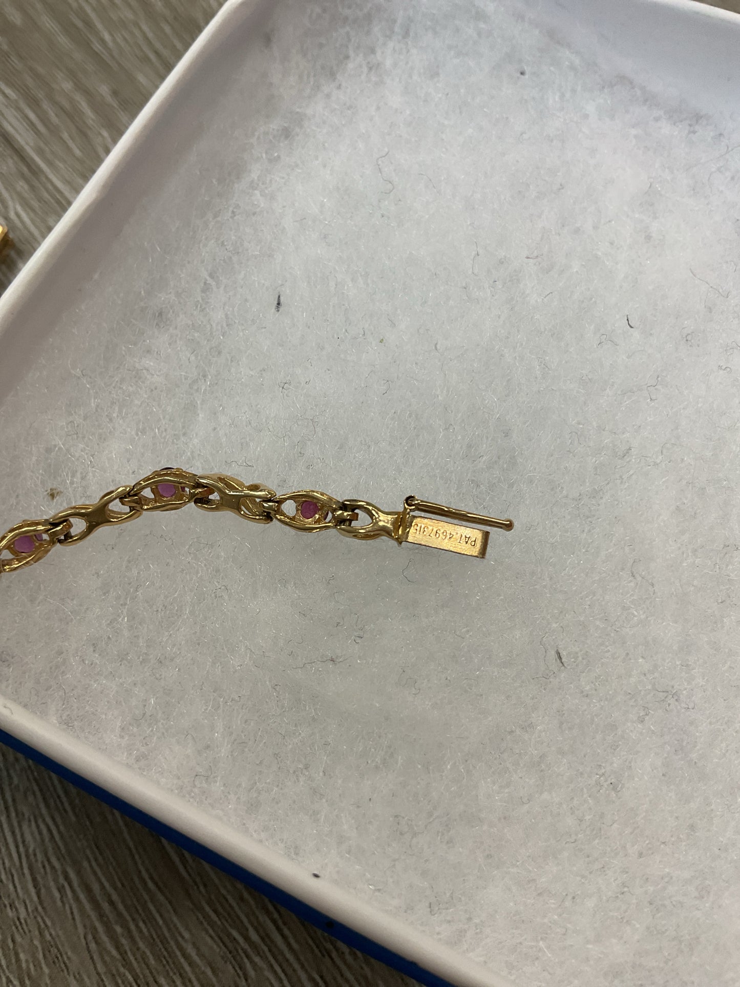 14K Bracelet ruby tennis 7"